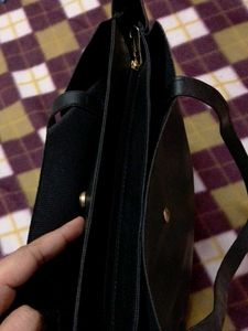 Leather Black Handbag Of Very Good Quality.