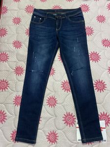 Ripped / Distressed Navy Blue Jeans