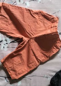 Two Boys Orange and green Shorts