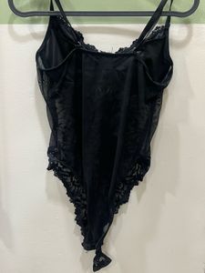 Sheer black bodysuit