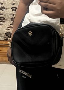 BATA Chic Black crossbag which also acts a sophist