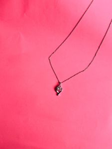 Twisted Elegance Diamond Pendant