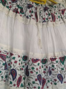Beautiful  White Long Skirt With Printed Flowering Design Also With Lase