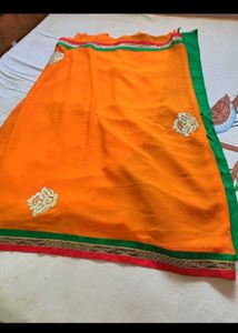 Elegant Orange Saree with Embroidery