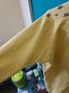 A Yellow Full Sleeved Winter Wear Sweatshirt