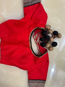 Red Blouse with Embellishments