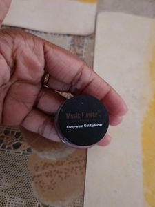 Silver Beaded Bracelet Set and a blue gel eyeliner