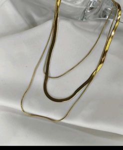 Golden triple layered necklace