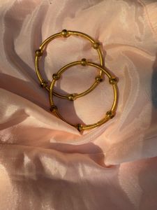pair of gold bangles