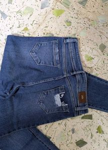 Pink Knit Top with blue denim jeans