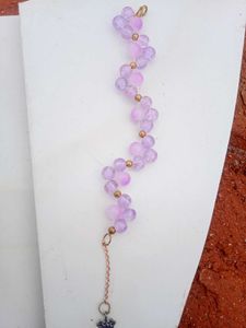 Purple Beaded Bracelet with Crown Charm