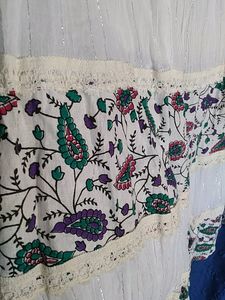 Beautiful  White Long Skirt With Printed Flowering Design Also With Lase