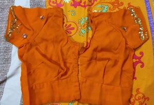 embroidered heavy orange saree