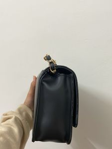Black “New” Sling bag