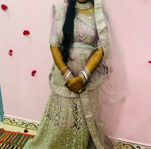 Bridal lehanga with aari work tassels 💜