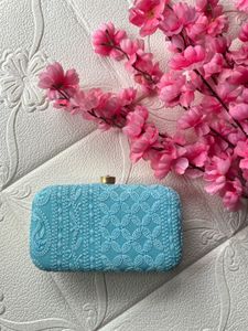 Sky blue chikankari clutch with sling belt