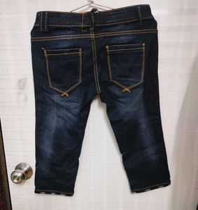 Distressed Denim Capri Pants