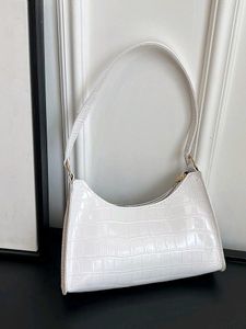 white crocodile-pattern Sling Bag