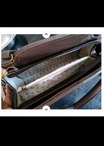 Brown Quilted Handbag with Sequins and Pom-Pom Cha