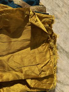 Teal Saree With Unstitched Blouse