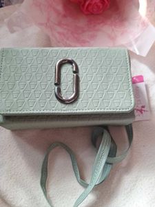 La Glory green sling bag