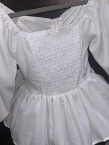 Coquette White Peplum Top