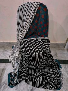 Green,red,black and white standard saree.