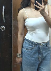 Pair Of White Sleeveless Tops
