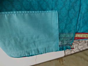 Pretty Blue Saree With Bright Red Border