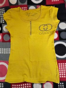 yellow and black top