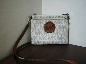 Authentic Mk monogram Sling Bag
