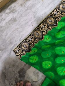 Green Leaf Saree With Yellow Stones.