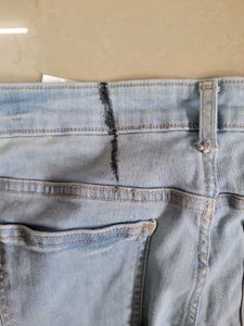 Ripped Light Wash Denim Jeans