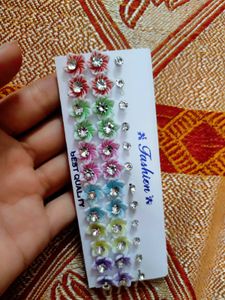 9 PAIR STUDS