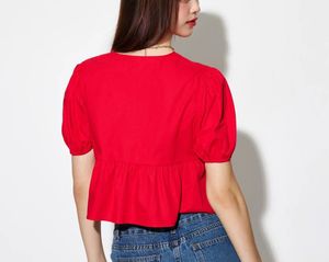 Pink Peplum Tie-Front Top
