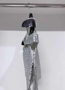 Silver flip‑sequin padded crop top