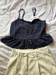 Navy Peplum Top