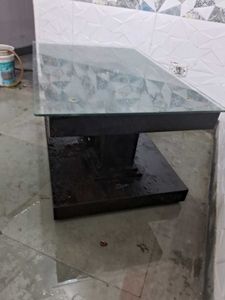 Glass Top Coffee Table with Floral Accent