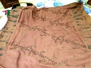 Rust colour saree with tie and die beautiful embroidery...pure georgette  saree