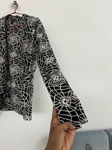 Patterned Black Shrug Top