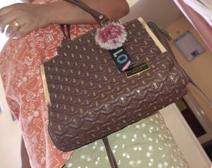 Brown Quilted Handbag with Sequins and Pom-Pom Cha