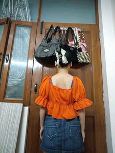 Orange Ruffle Sleeve Peplum Top