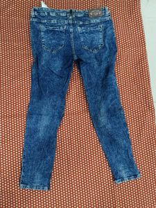 Distressed Denim Jeans