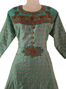Elegant Green Dress with intricate embroidery