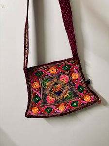 Freebie Embroidered Sling Bag