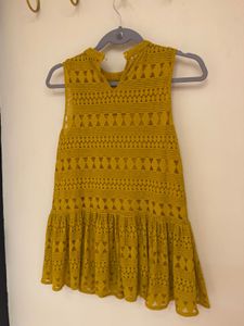 Sleeveless high neck top with slip