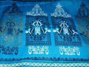 Womens Blue Cotton Saree With Golden Bady.