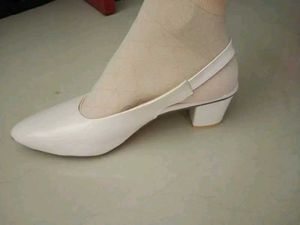 Elegant White Ballerinas