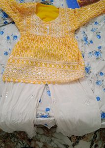 Embroidered Yellow short kurti