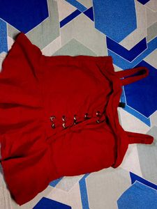 Sleeveless Beautiful Top In Maroon Colour